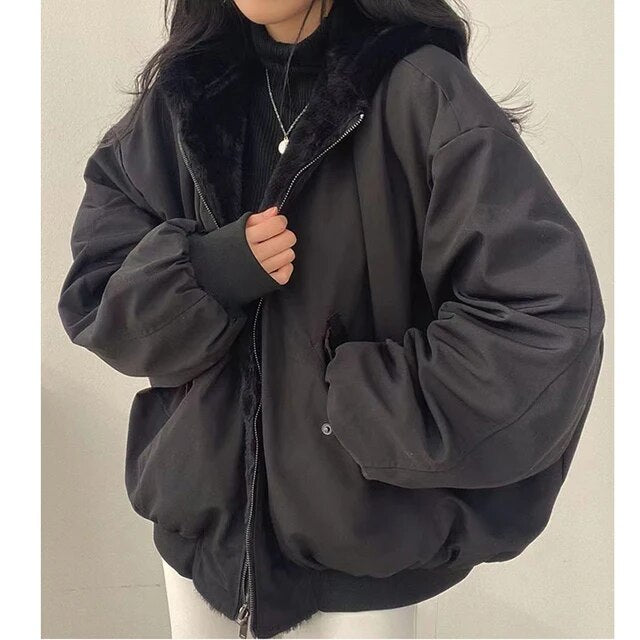 Noir – Chaqueta acolchada negra con capucha para mujer