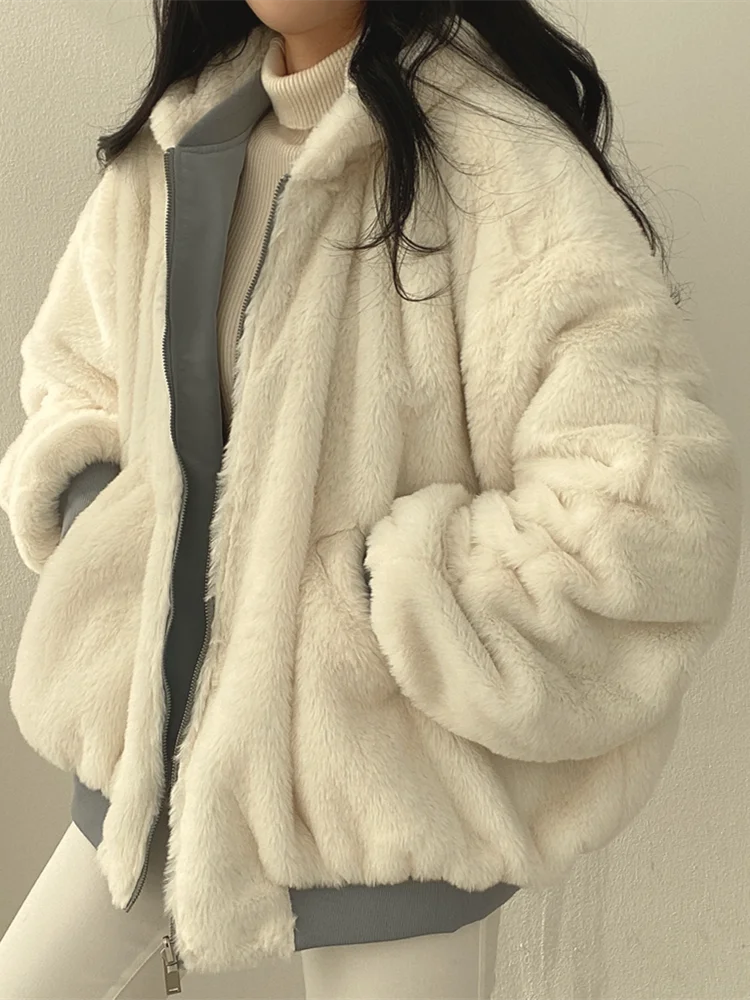 Noir – Chaqueta acolchada negra con capucha para mujer