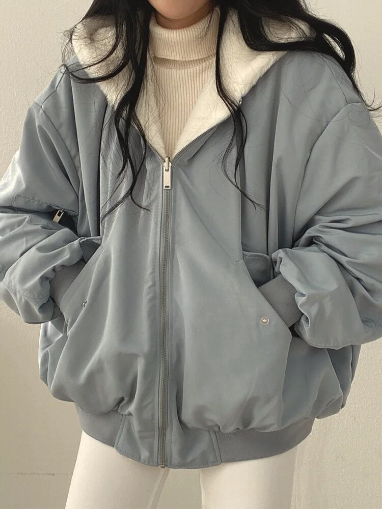 Noir – Chaqueta acolchada negra con capucha para mujer