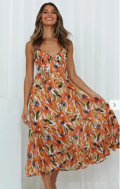 Camila - Vestido midi estampado con volante en el bajo