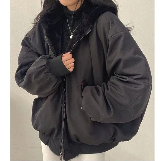 Noir – Chaqueta acolchada negra con capucha para mujer